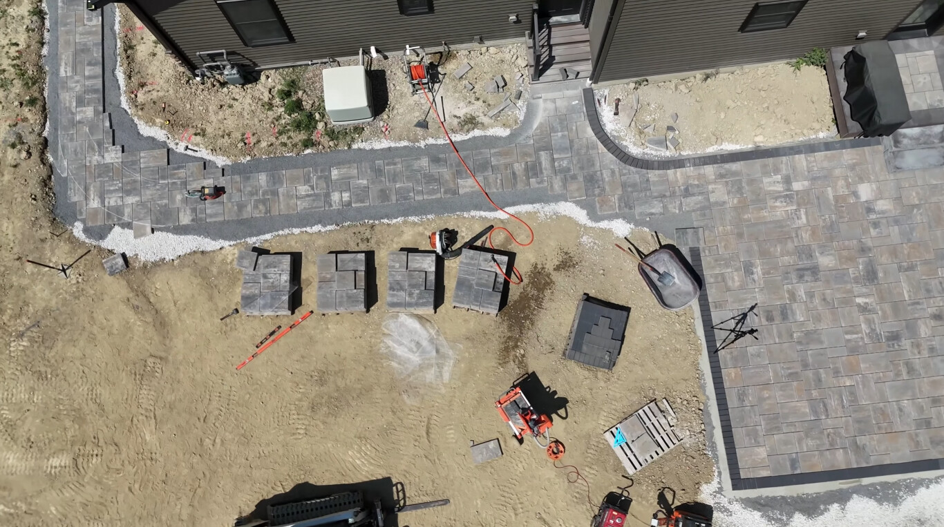 Custom concrete patio installation aerial view showing detailed workmanship